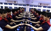 ホンコンの客室乗務員にカンフー訓練が義務化